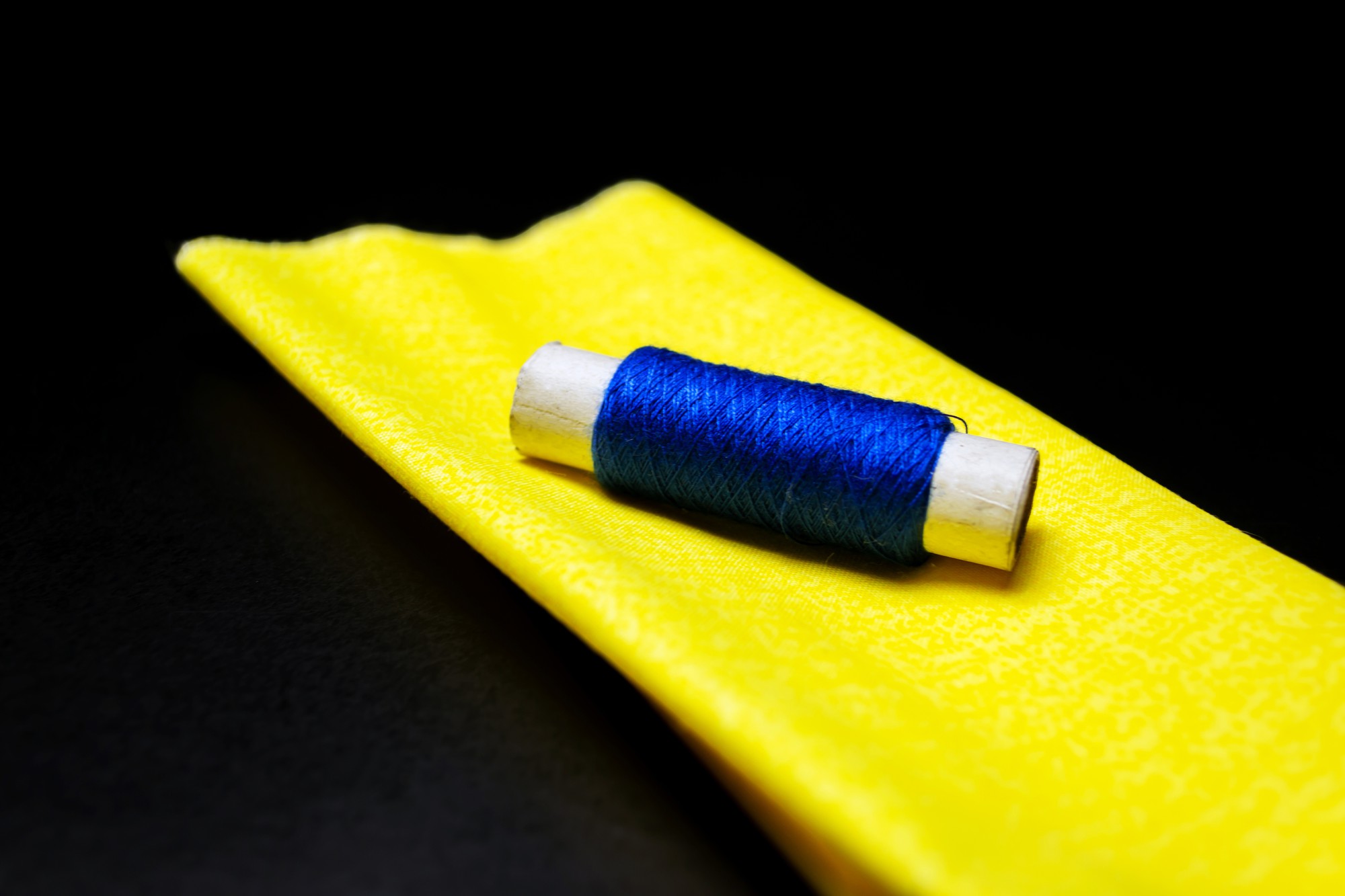 detail of neon thread embroidered pattern